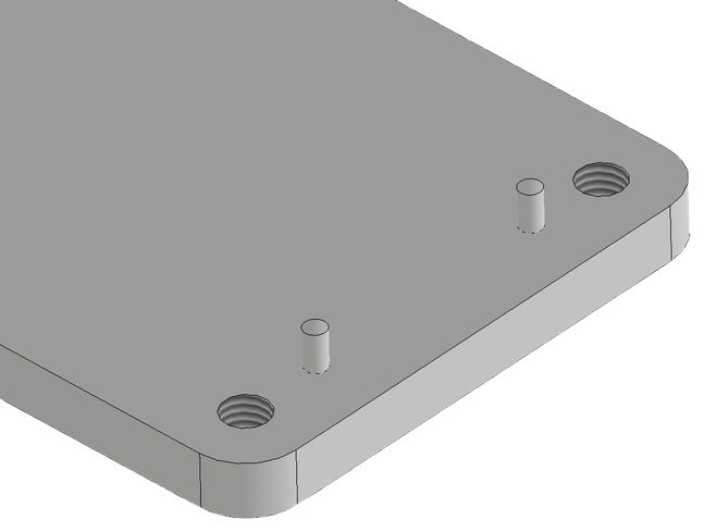 Model CAD płyty z dwoma kołkami walcowymi wystającymi obok otworów gwintowanych, kołki rozstawione asymetrycznie.